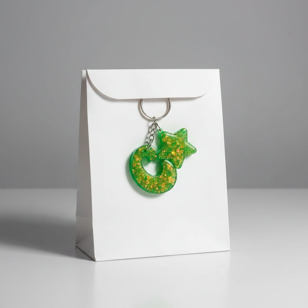 Green glitter resin moon star heart keychain on kraft card