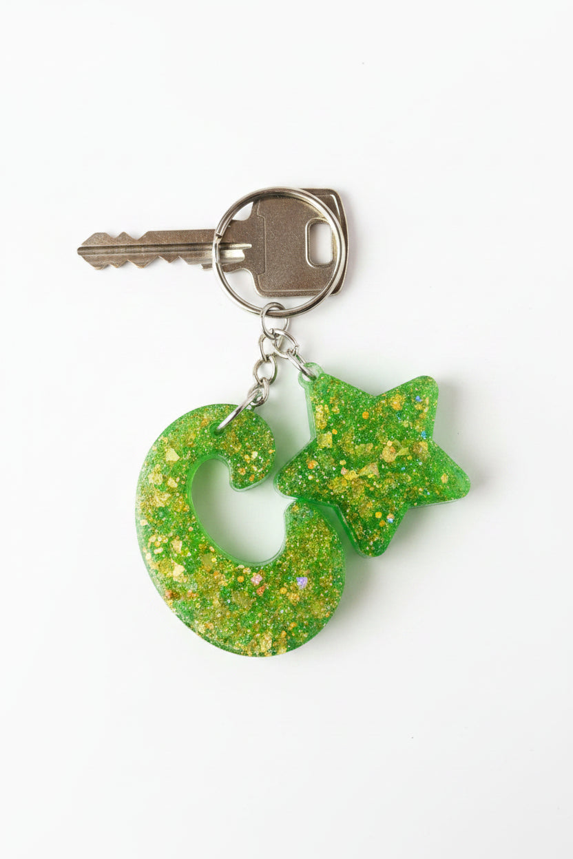 Green glitter resin keychain detail view
