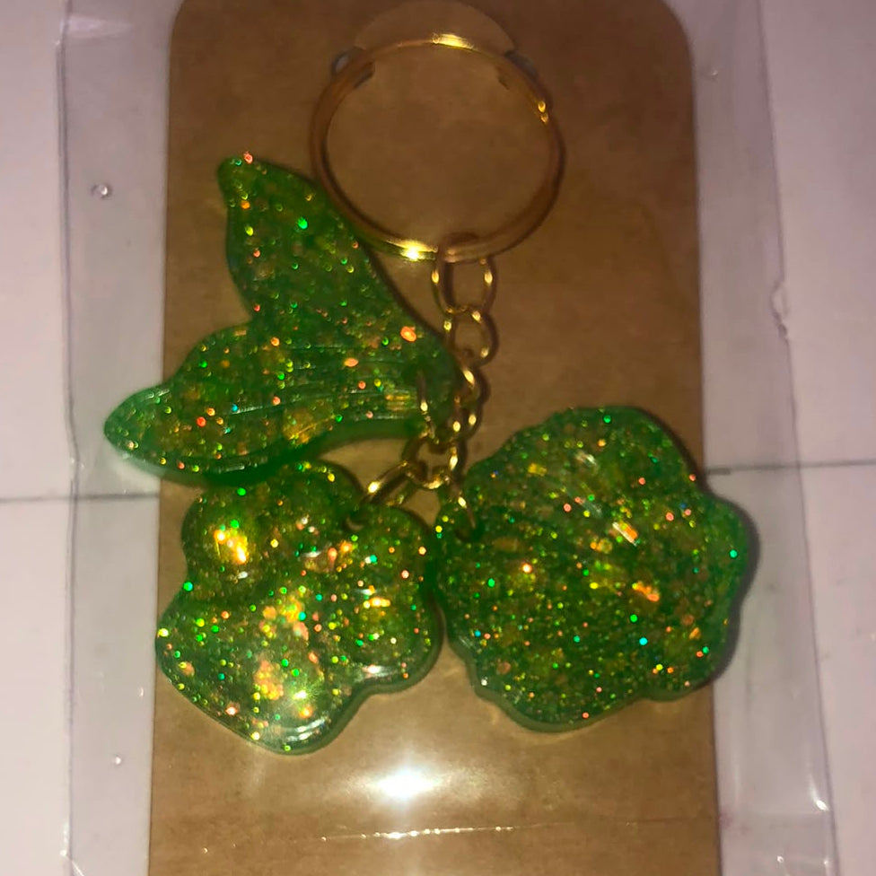 Green glitter resin cherry keychain detail view