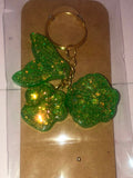 Green glitter resin cherry keychain on kraft card